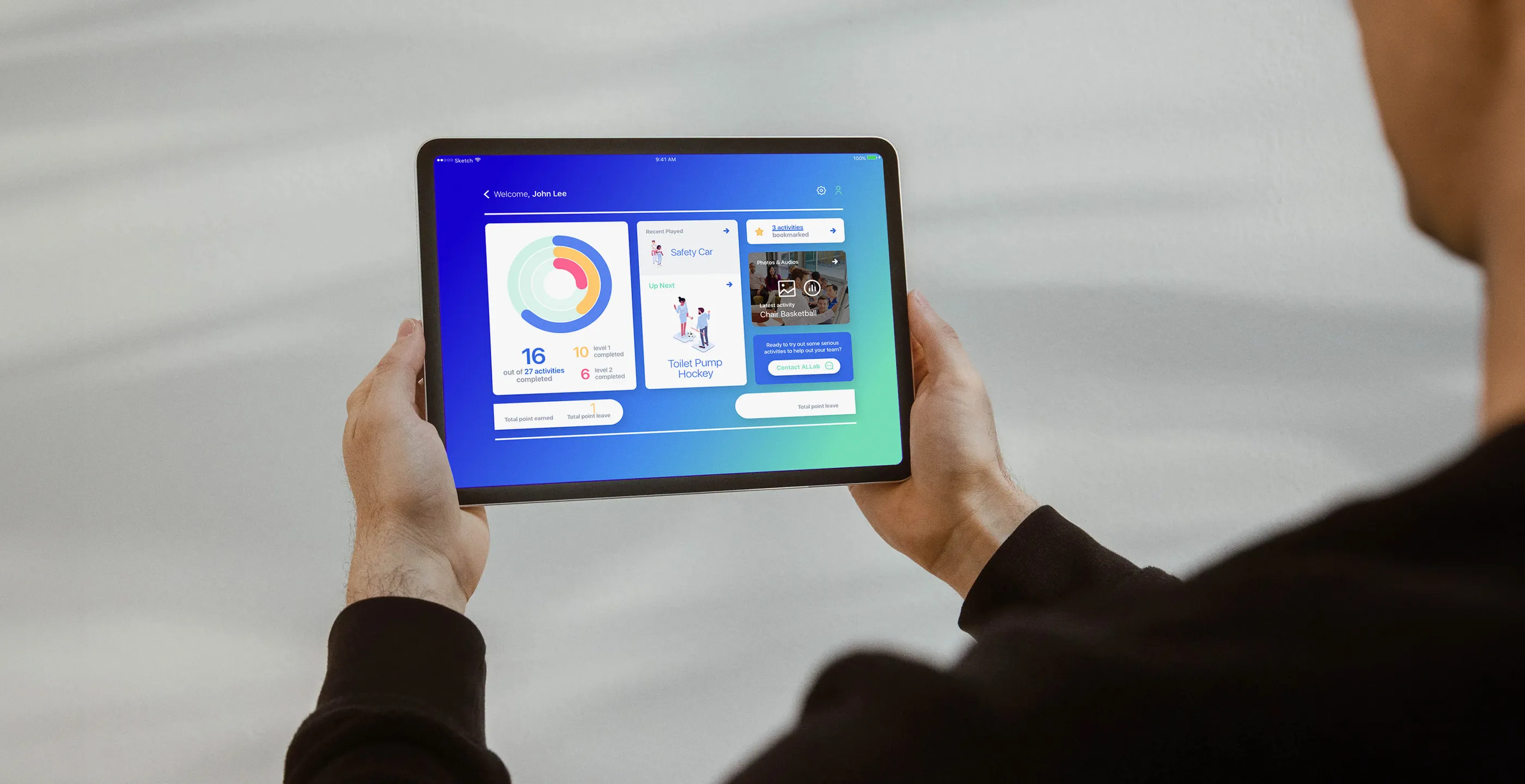A man holding a device installed with Facilitation Tool App