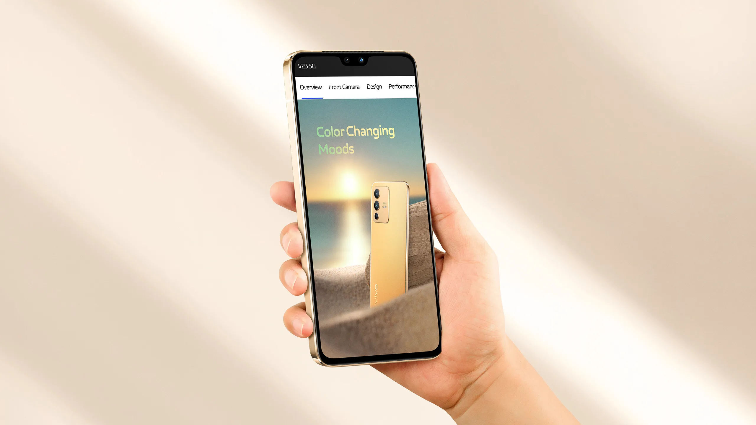 A hand holding a device showing website design